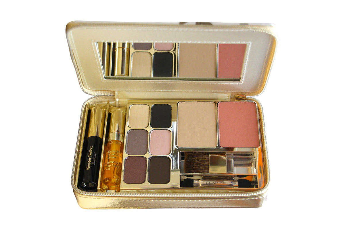 Clarins-Set: Clarins, Multi-Use, Gesichtspalette, 8 Farben, 18 g + Wonder Volume, Volumen-Mascara, Schwarz, 3 ml *Miniatur + Lip Comfort, glänzendes Lippenöl, 2,8 ml *Miniatur + Clarins, GWP-Textiltäschchen